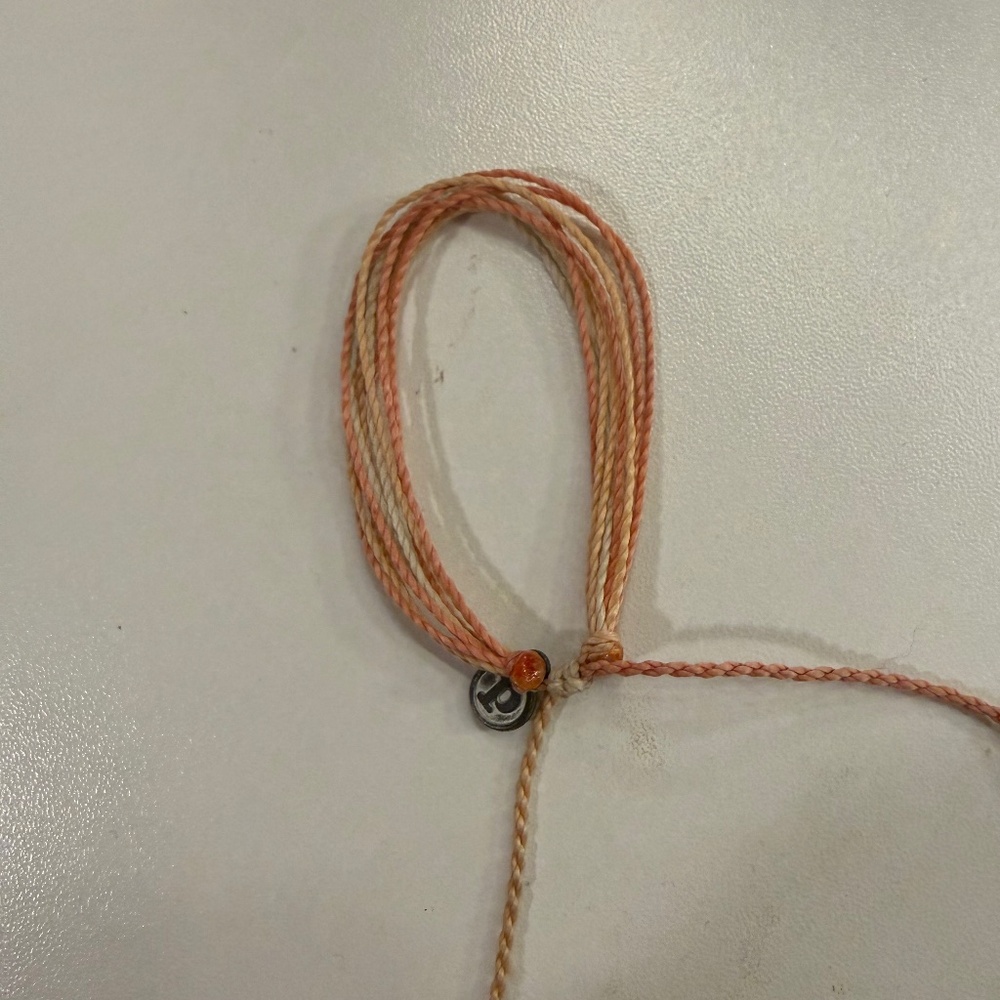 Orange and cream Pura Vida bracelet